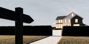A home with an empty signpost, considering the disadvantages of a VA loan.