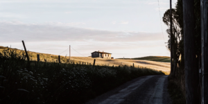 A country house on a rural road in a USDA eligible area.