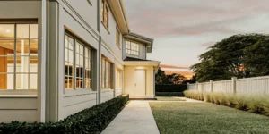 Modern home exterior financed with a bank statement loan using a qualifying credit score.